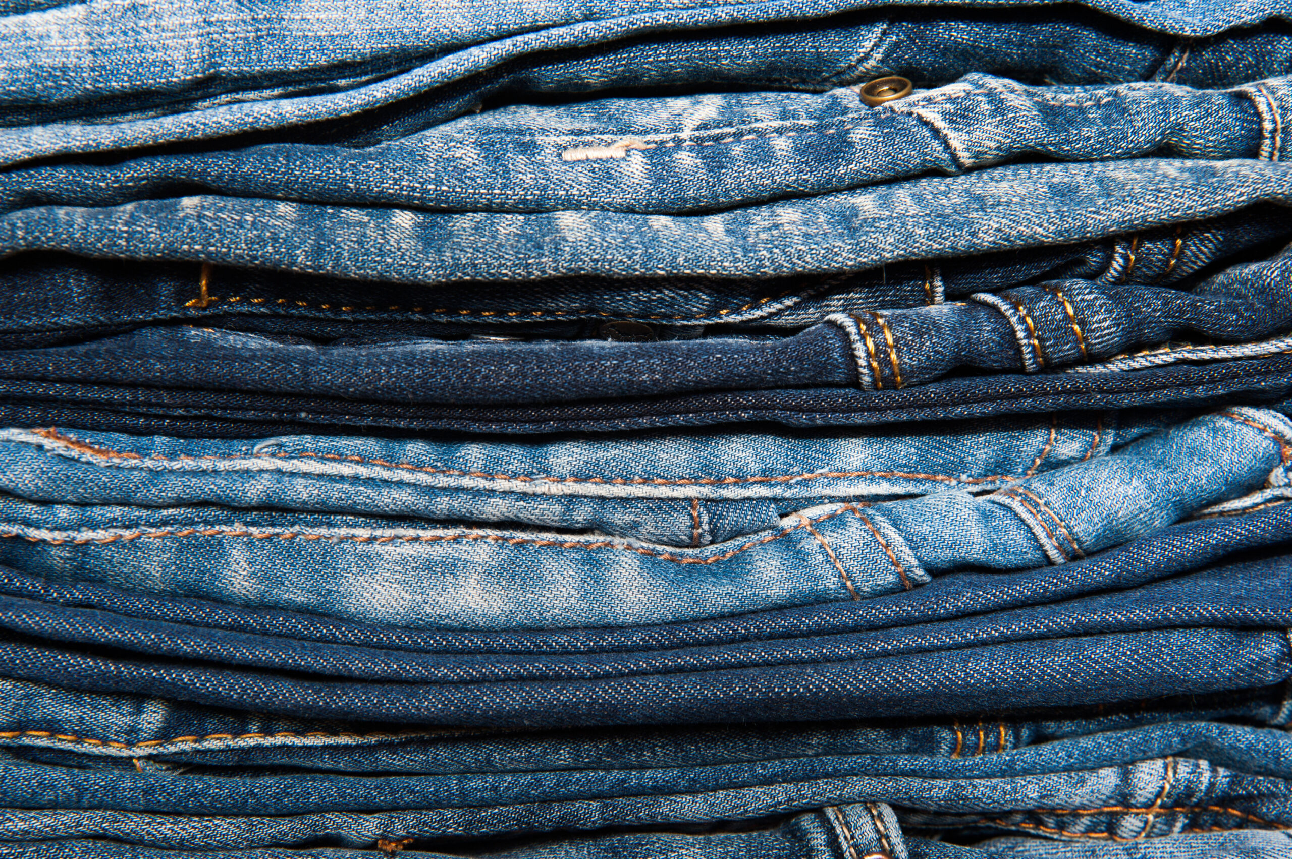 Stack,Of,Jeans.,Background,Fashion,Jeans.